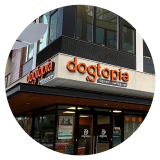 Dogtopia logo on a storefront